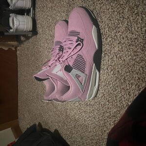 Trendy Pink Sneakers with Black and White Details